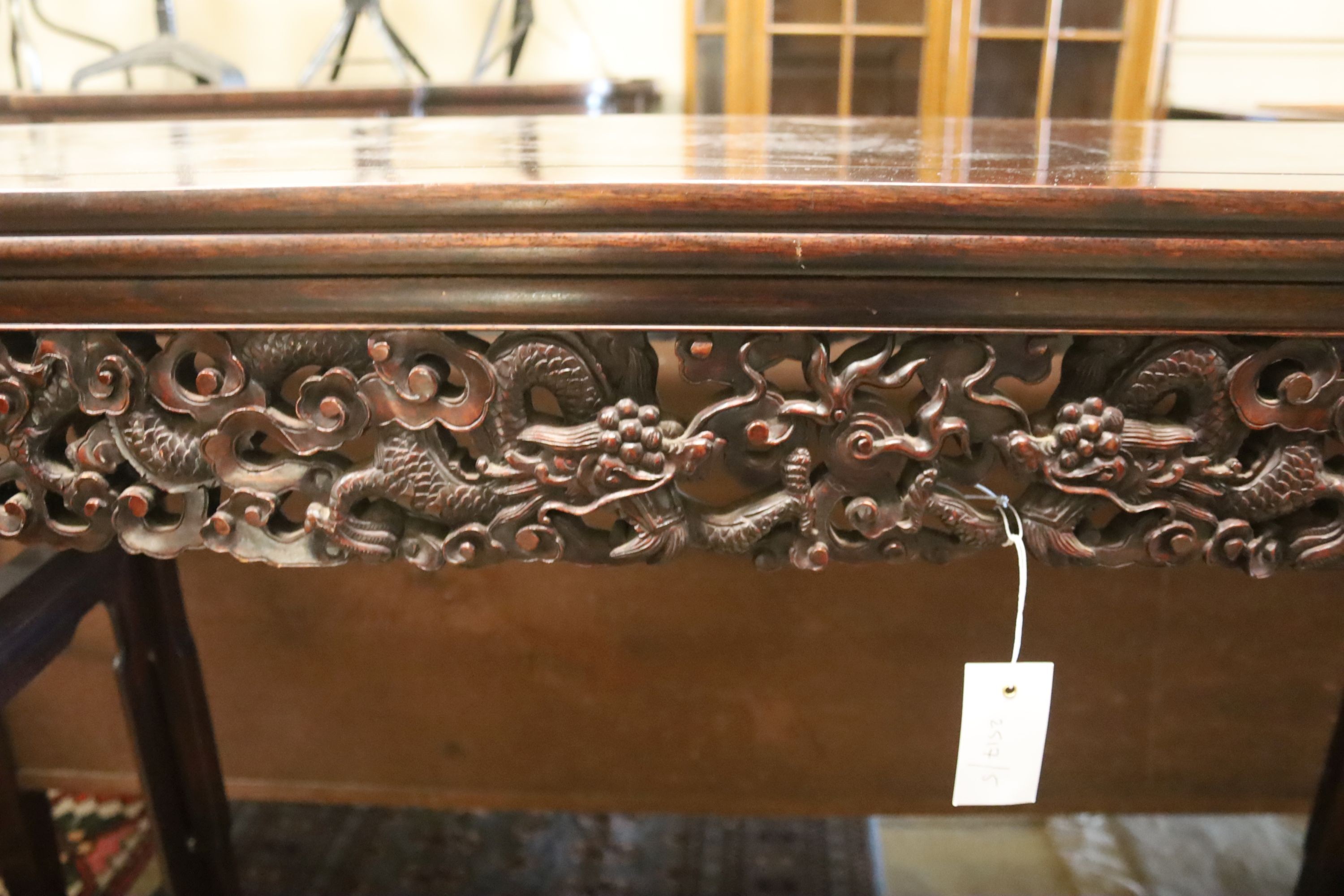 A Chinese altar table, width 150cm, depth 45cm, height 102cm